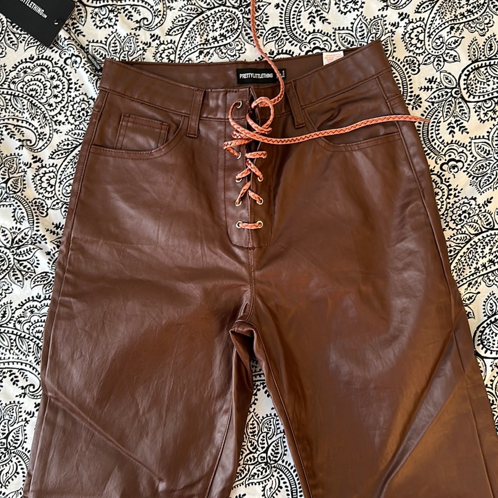Pretty little thing pleather brown lace up trousers. Brand new w/ tags